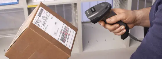 person scanning a parcel
